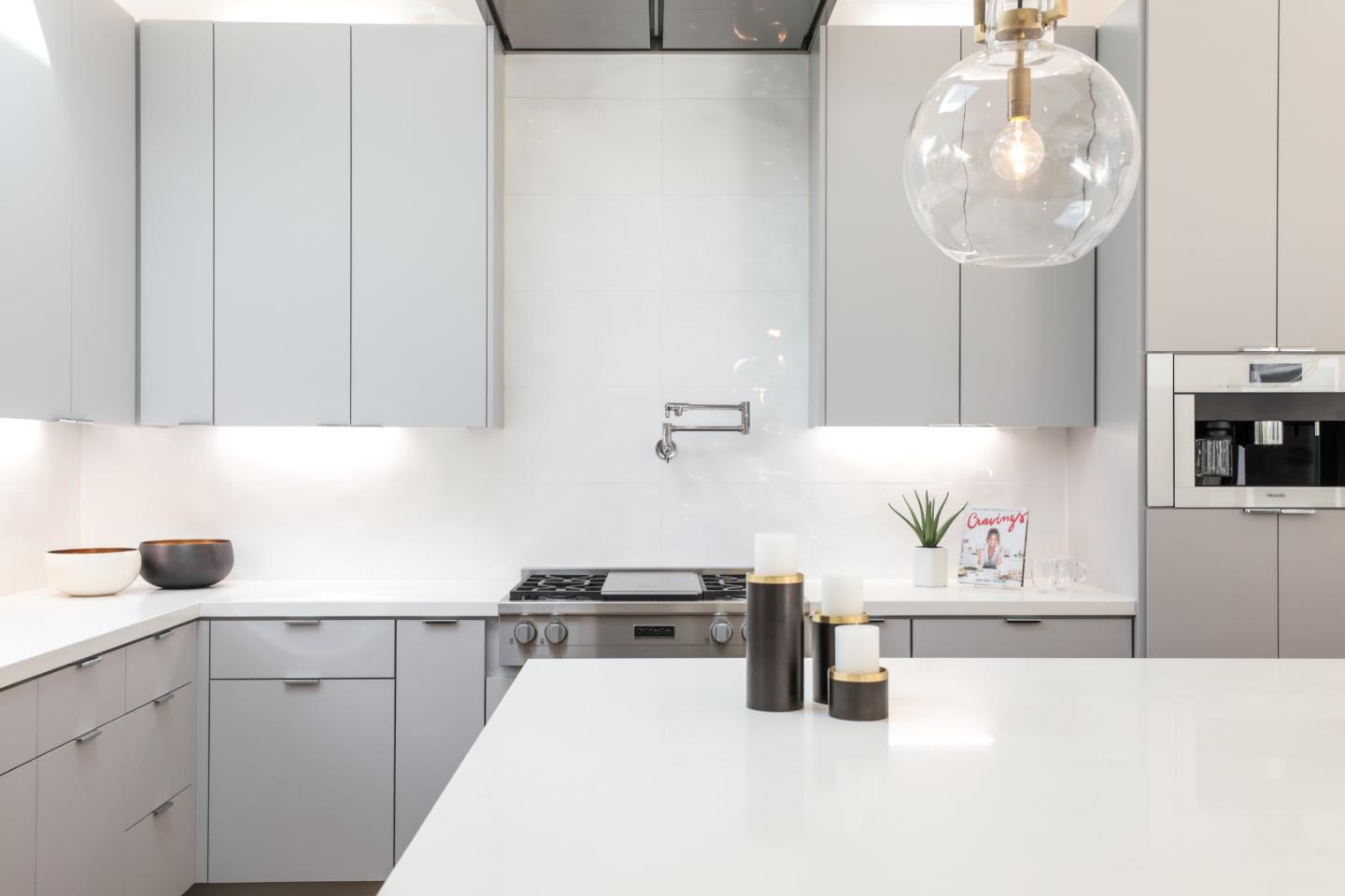 249 Monroe Drive Mountain View, CA 94040 - Photo 9 of 50 a kitchen with cabinets and window