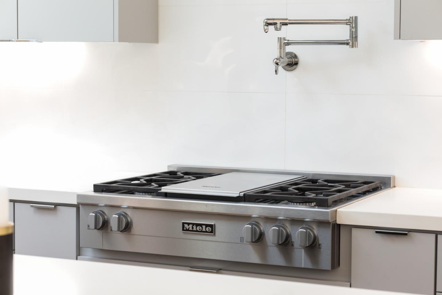 249 Monroe Drive Mountain View, CA 94040 - Photo 10 of 50 a close view of stove top oven with granite countertops