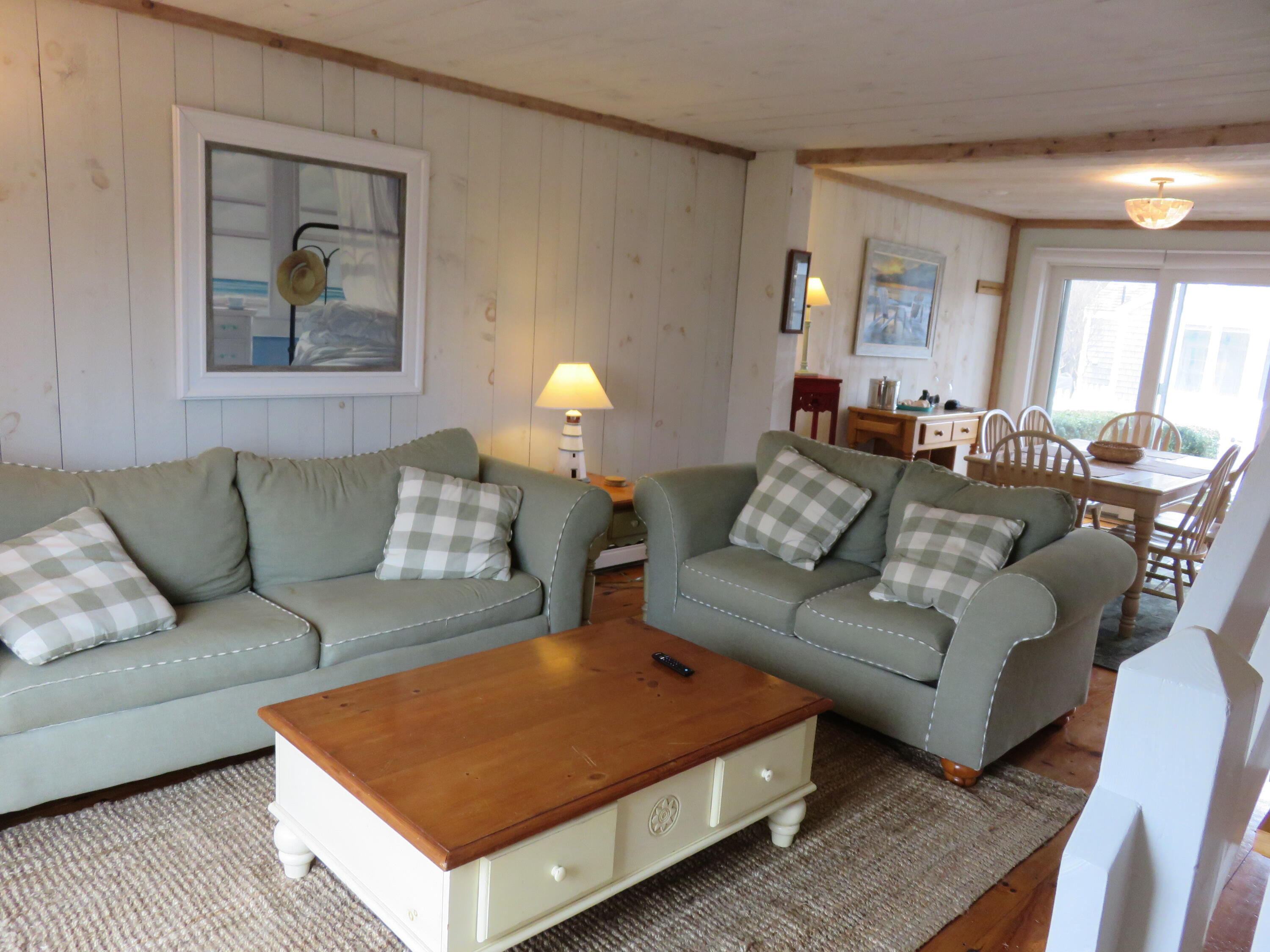 16 Brant Rock Road Mashpee, MA 02649 - Photo 11 of 23 a living room with furniture and a couch
