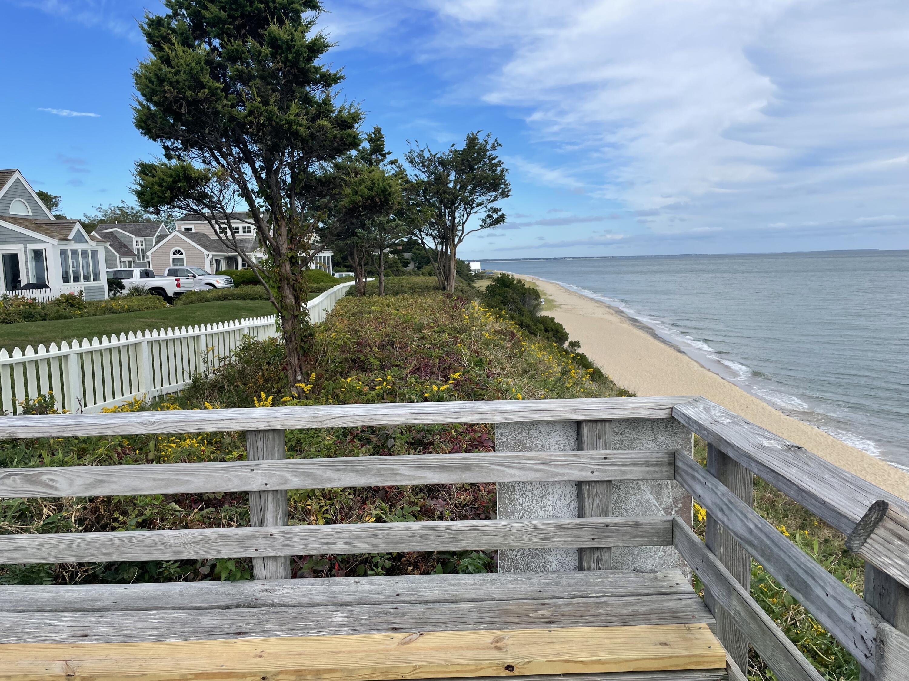 16 Brant Rock Road Mashpee, MA 02649 - Photo 18 of 23 a view of a swimming pool with a bench
