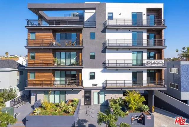 a front view of a multi story residential apartment building