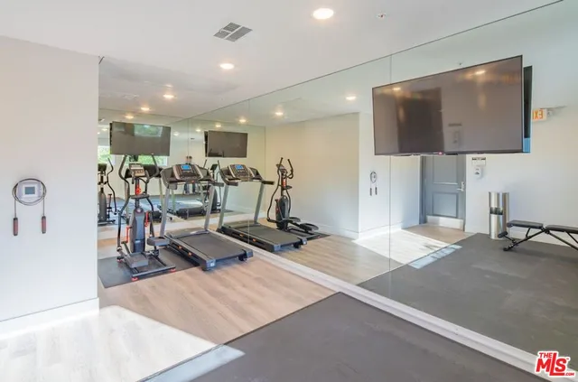 a view of a room with gym equipment