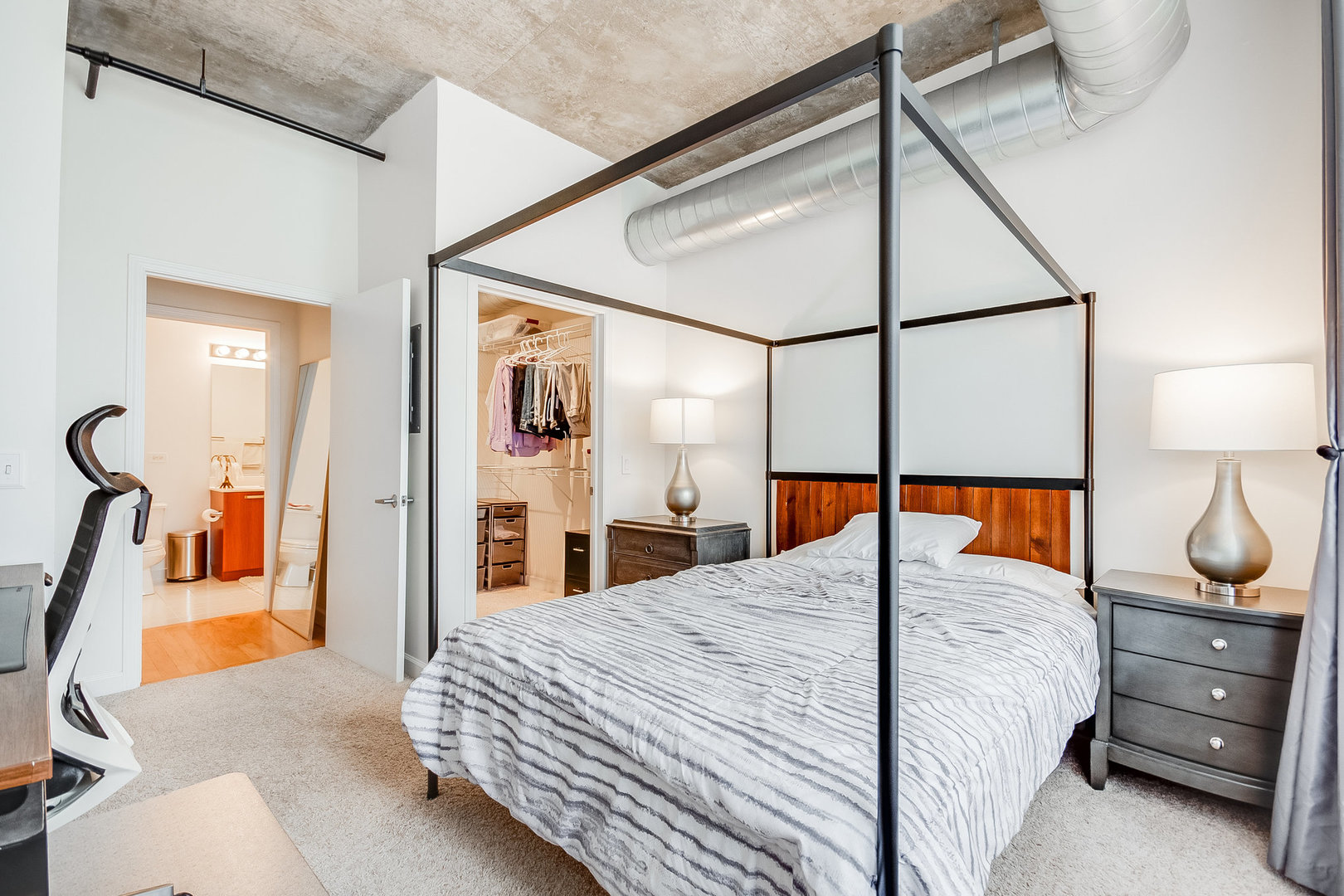 111 South Morgan Street, Unit 416 Chicago, IL 60607 - Photo 11 of 15 a bedroom with double bed and a window
