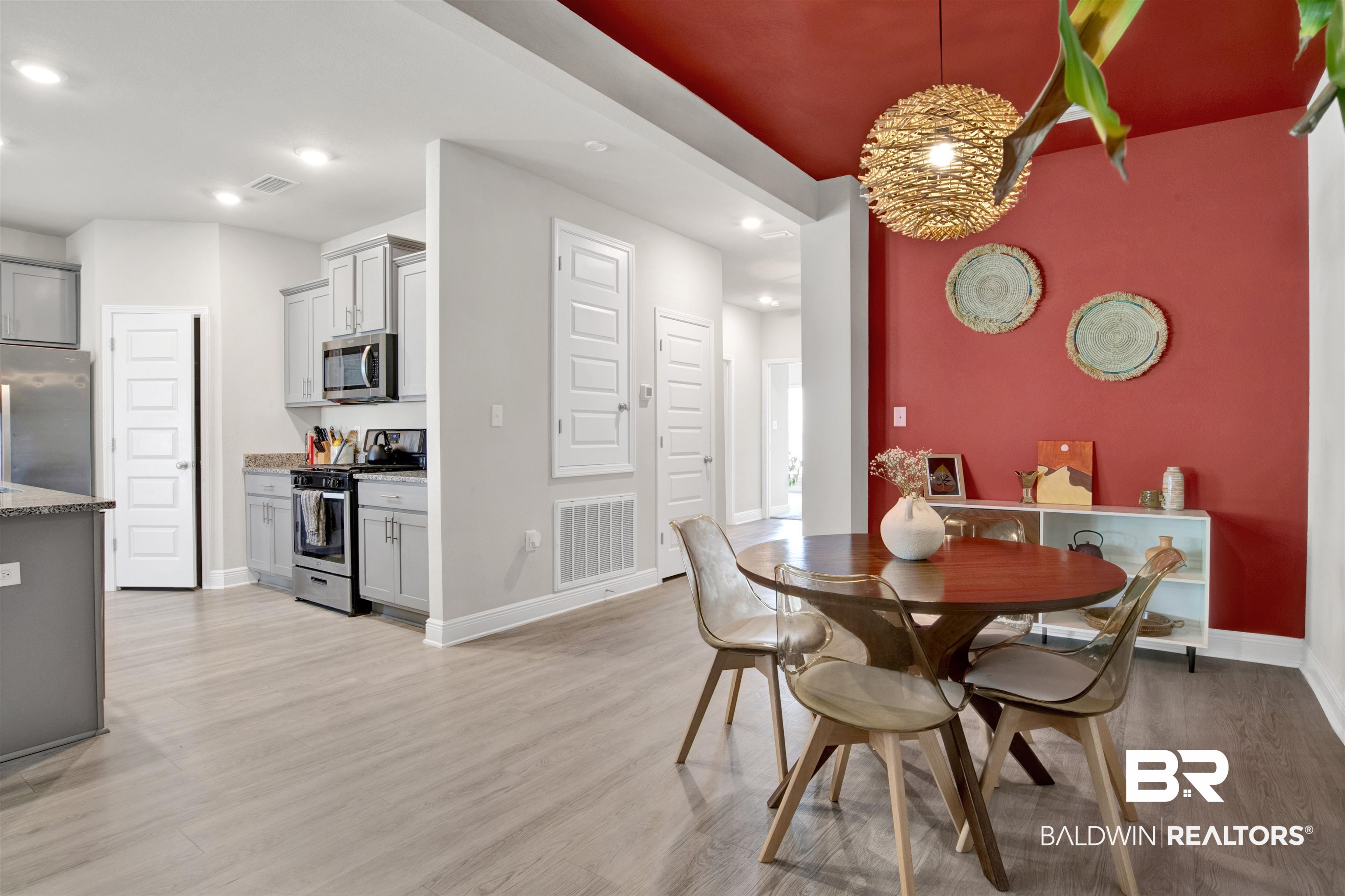 24253 Alydar Loop Daphne, AL 36526 - Photo 6 of 44 Dining space with light wood-style flooring and recessed lighting