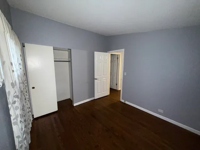 a bathroom with a toilet and a bathtub