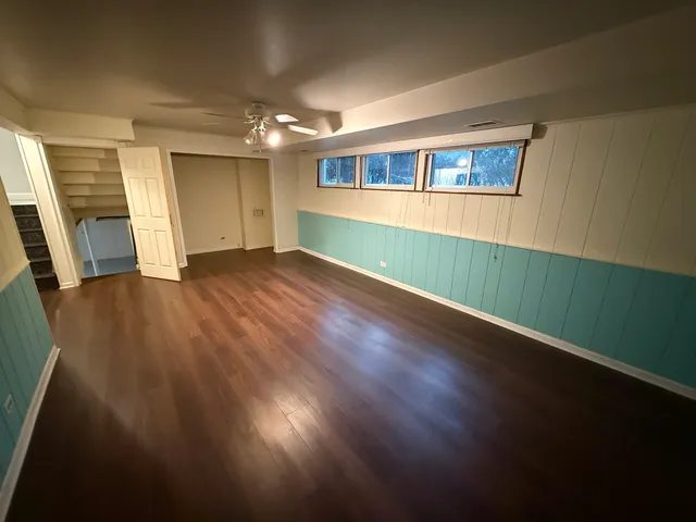 a bathroom with a glass door shower
