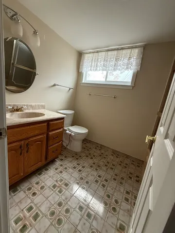 a view of a storage & utility room with a sink