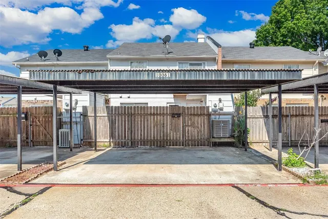 a view of a balcony with a potted plants