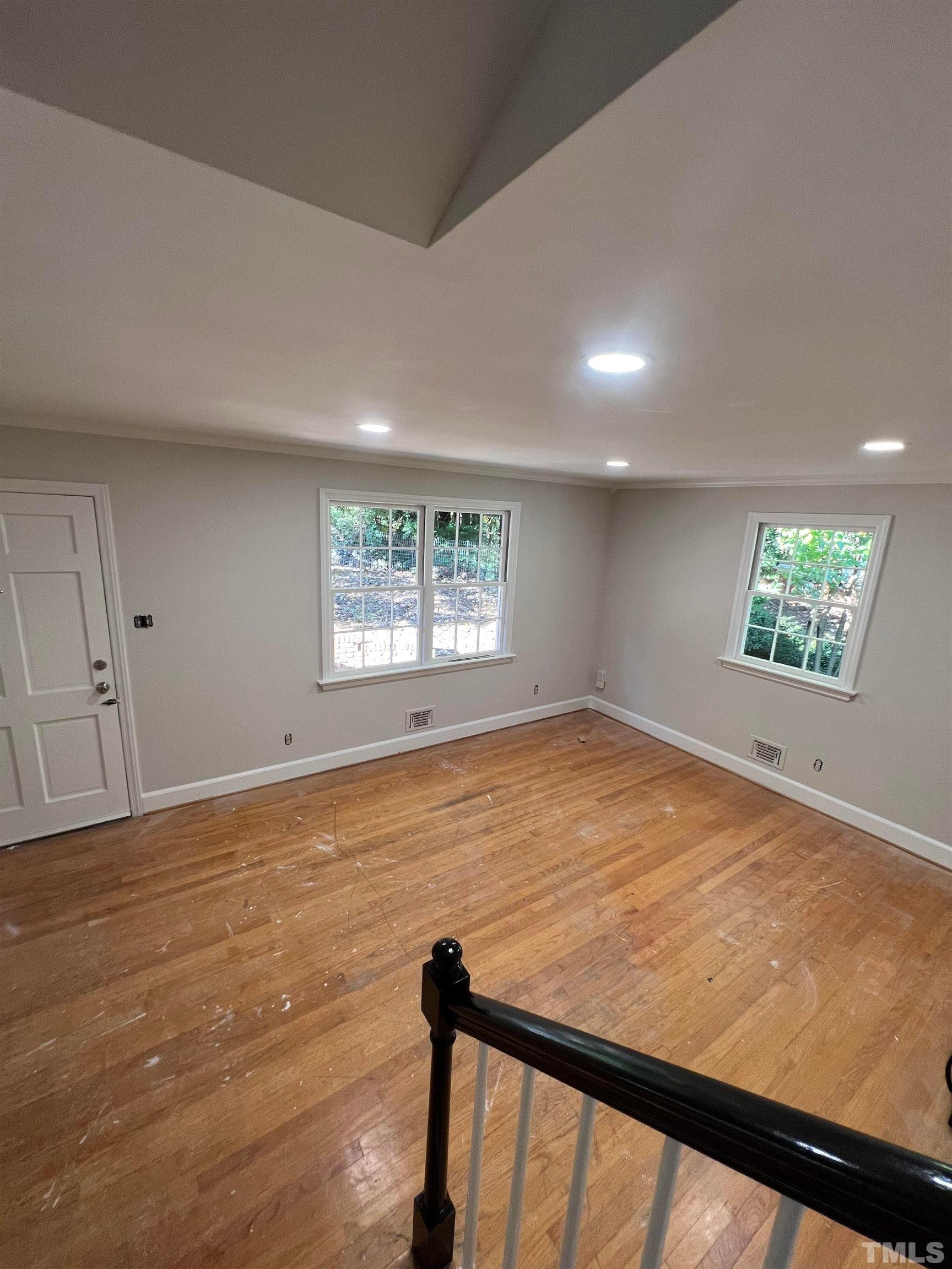 913 Brookwood Drive Raleigh, NC 27607 - Photo 12 of 23 a view of an empty room and window