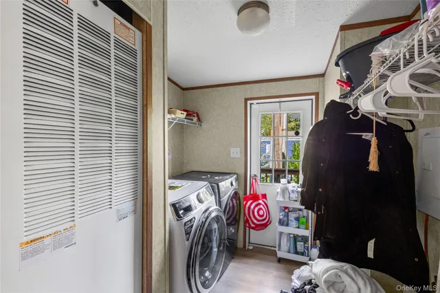 a view of a house with wooden deck