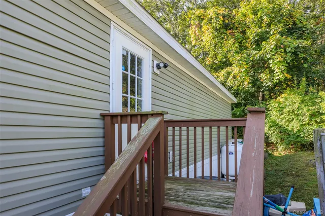 a view of a house with a street