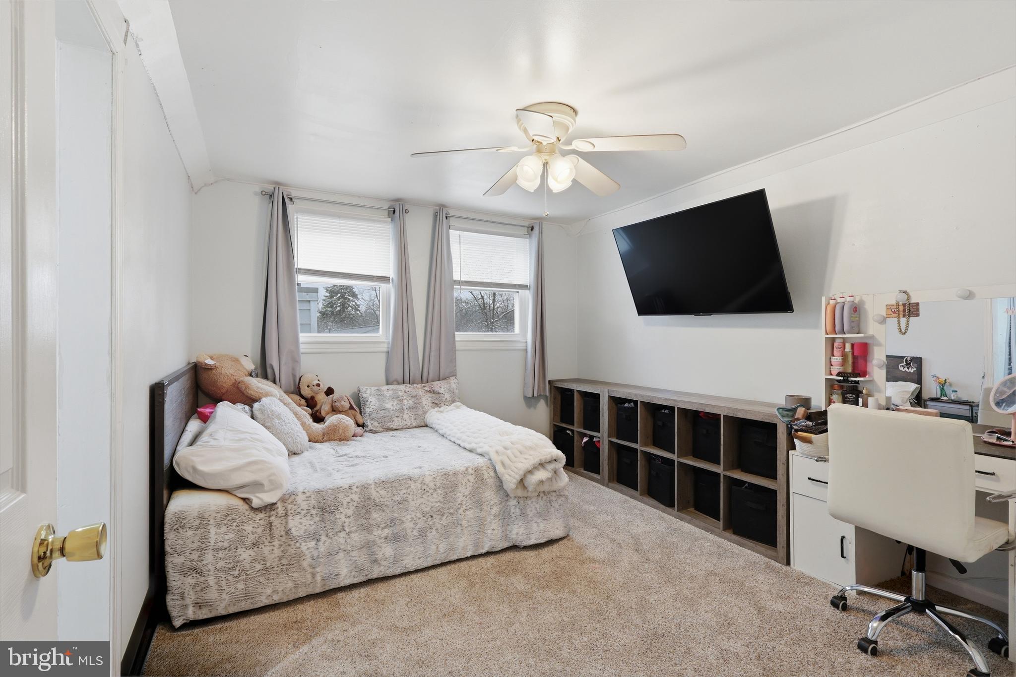 112 North Kennedy Road Sterling, VA 20164 - Photo 22 of 39 a bedroom with a bed and a flat screen tv
