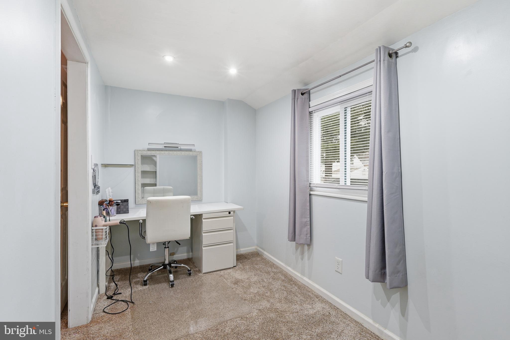 112 North Kennedy Road Sterling, VA 20164 - Photo 23 of 39 a view of a workspace with furniture and a window
