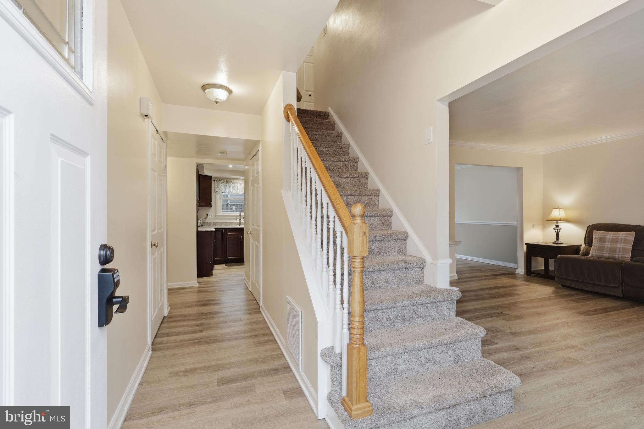 112 North Kennedy Road Sterling, VA 20164 - Photo 4 of 39 a view of a hallway view with staircase