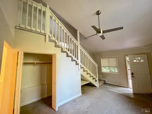 a view of an entryway with a workspace