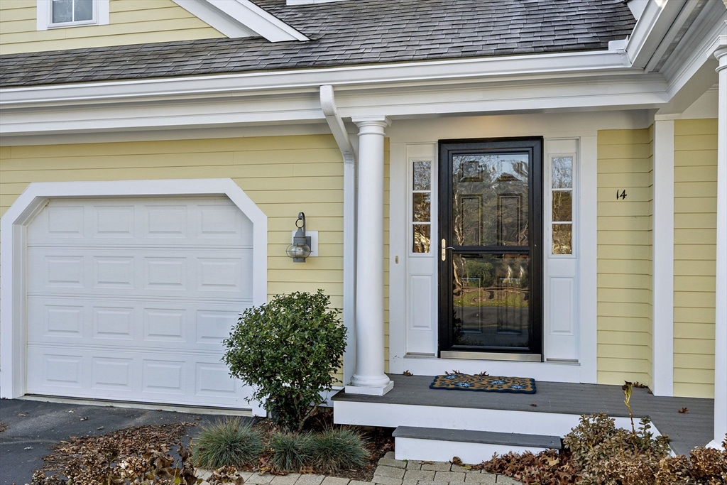 14 Red Pony Path, Unit 14 Marshfield, MA 02050 - Photo 2 of 40 a front view of a house with a yard