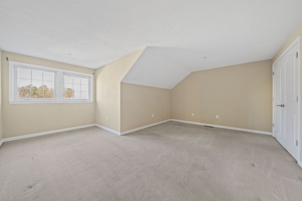14 Red Pony Path, Unit 14 Marshfield, MA 02050 - Photo 23 of 40 a view of an empty room with a window