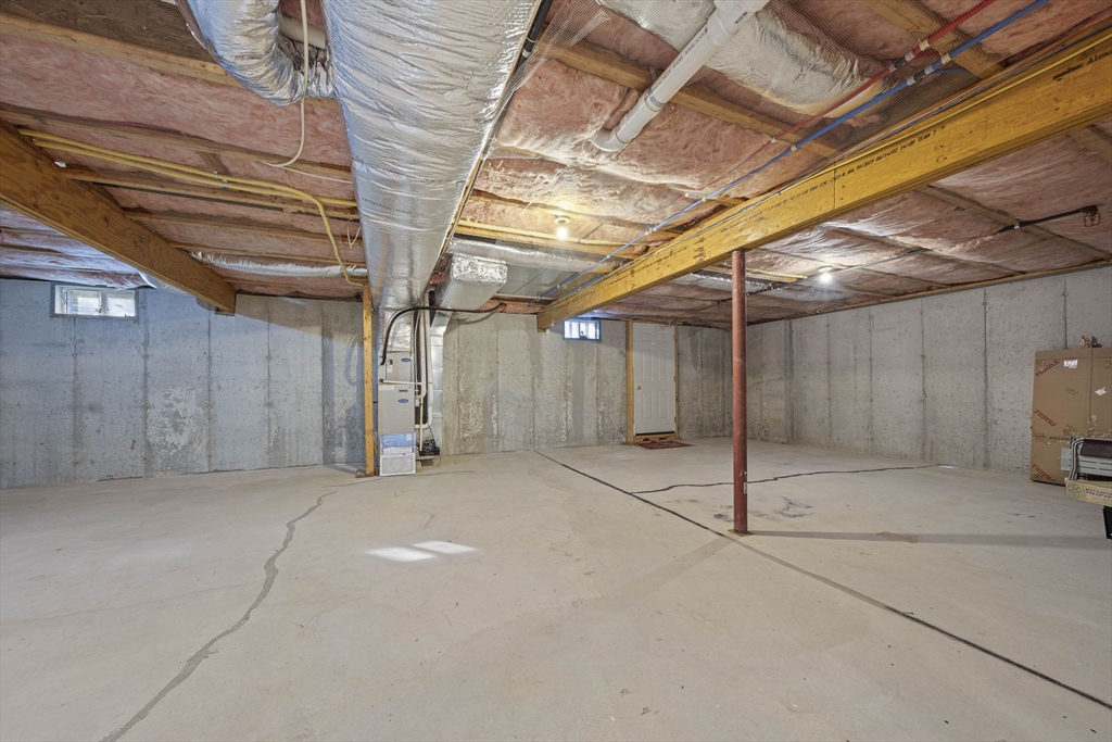 14 Red Pony Path, Unit 14 Marshfield, MA 02050 - Photo 31 of 40 a view of a room with wooden walls