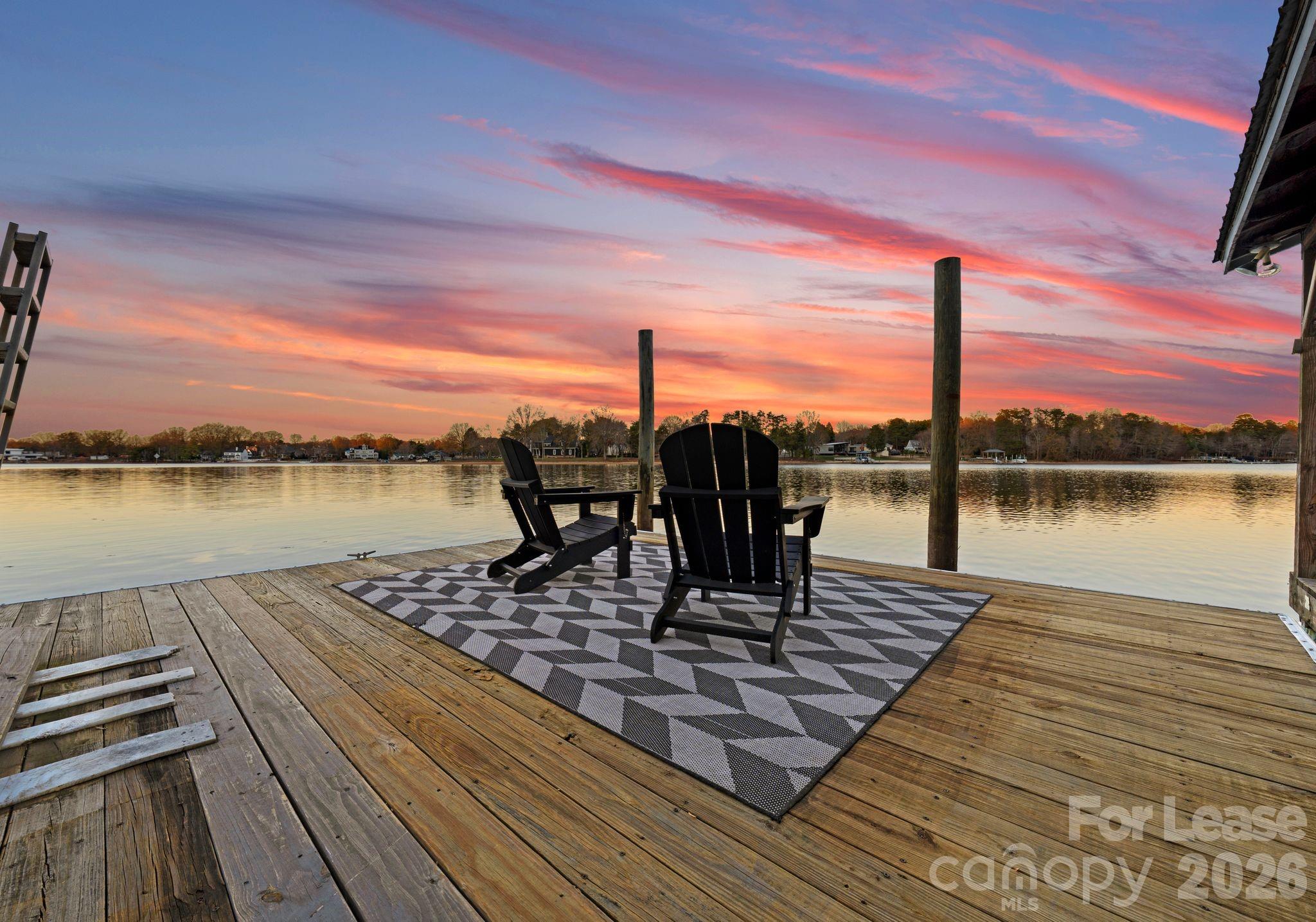 19709 Stough Farm Road Cornelius, NC 28031 - Photo 40 of 48 a view of a lake with sitting area