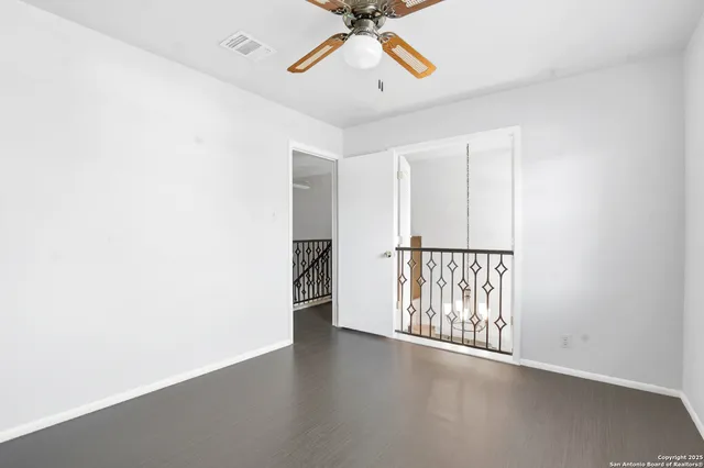 a view of entryway with wooden floor