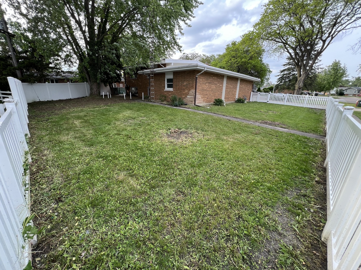 616 Seneca Drive Aurora, IL 60506 - Photo 36 of 36 a view of a house with a yard
