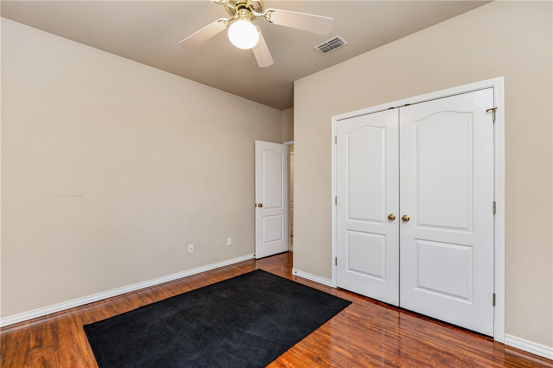 7306 Sun Valley Drive Corpus Christi, TX 78413 - Photo 27 of 40 wooden floor in an empty room