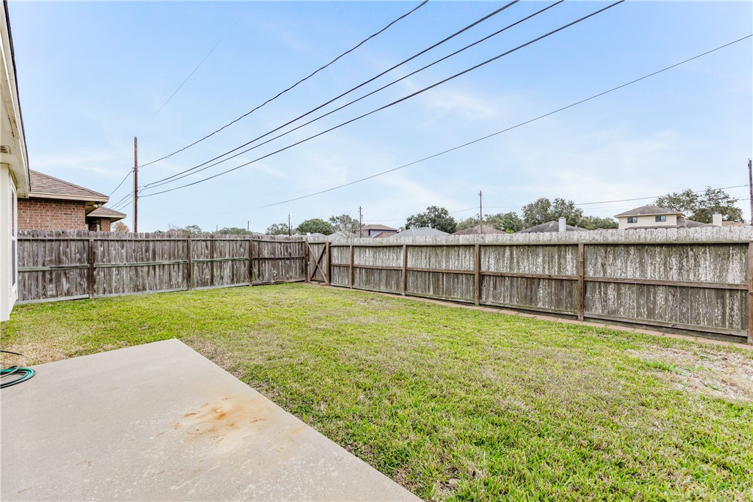 7306 Sun Valley Drive Corpus Christi, TX 78413 - Photo 33 of 40 a view of a backyard with a lake view
