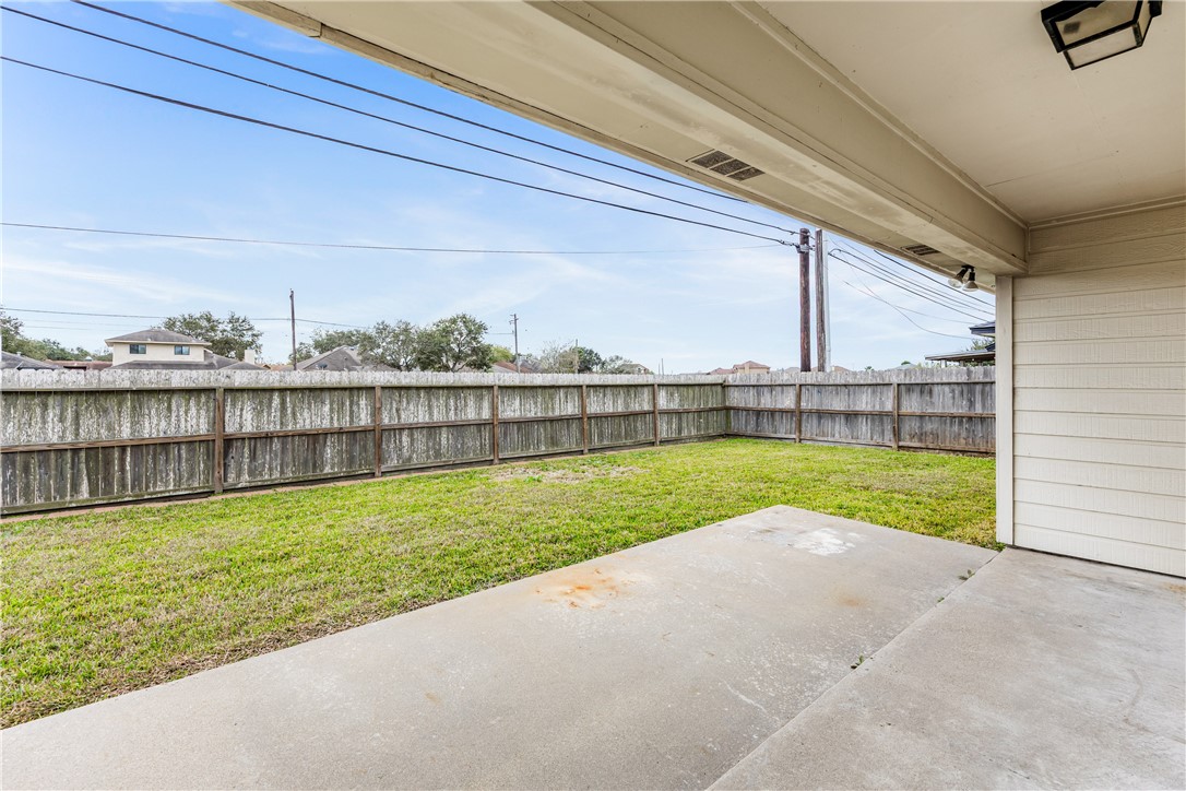 7306 Sun Valley Drive Corpus Christi, TX 78413 - Photo 38 of 40 a view of swimming pool with patio and a yard