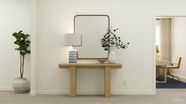 a vase of flowers sitting on a table