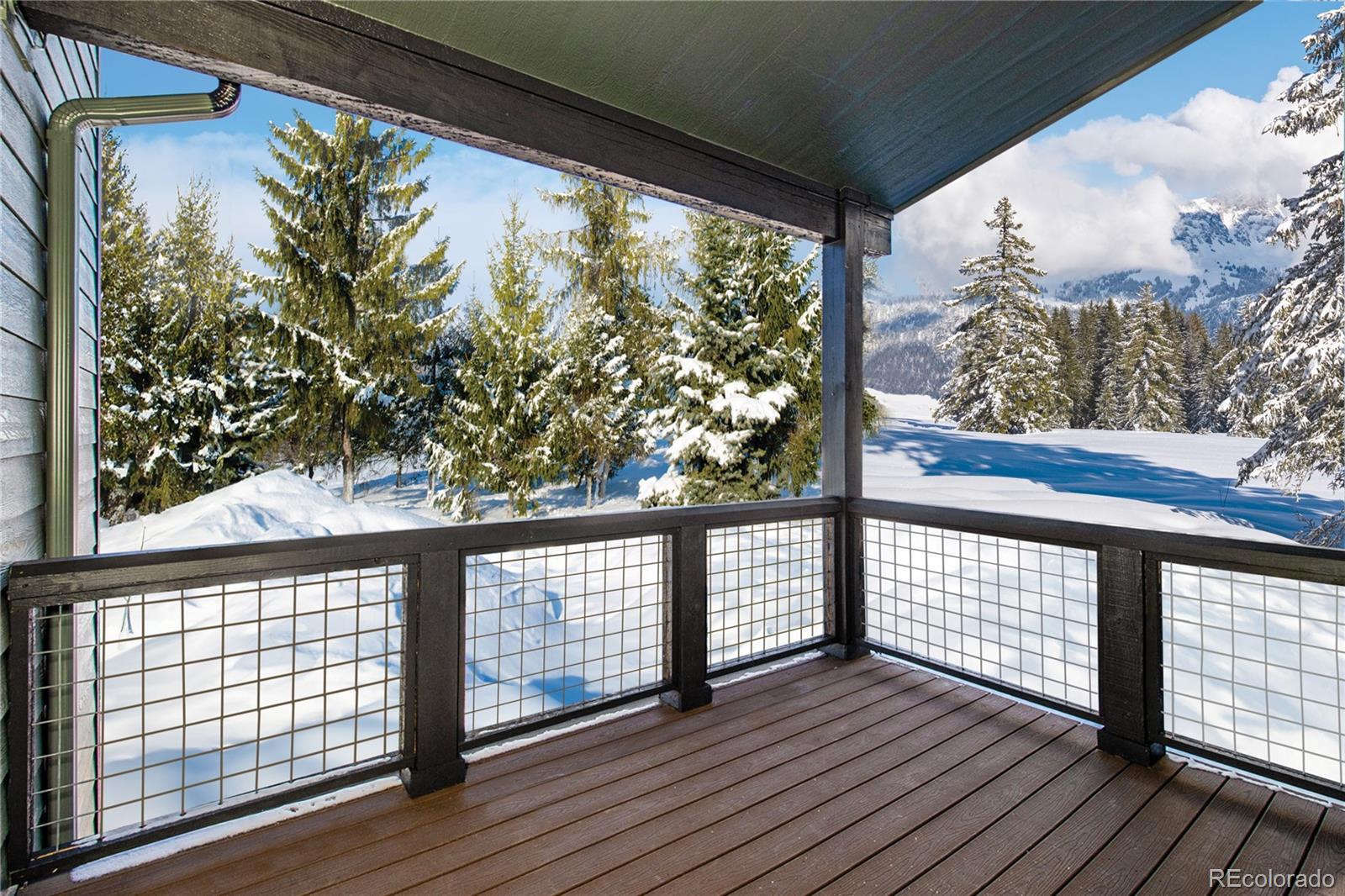 98 High Grove Loop Winter Park, CO 80482 - Photo 21 of 24 a view of a balcony with wooden floor