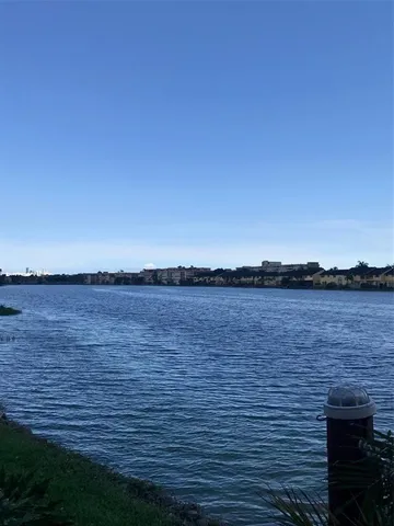 a view of a lake from a yard