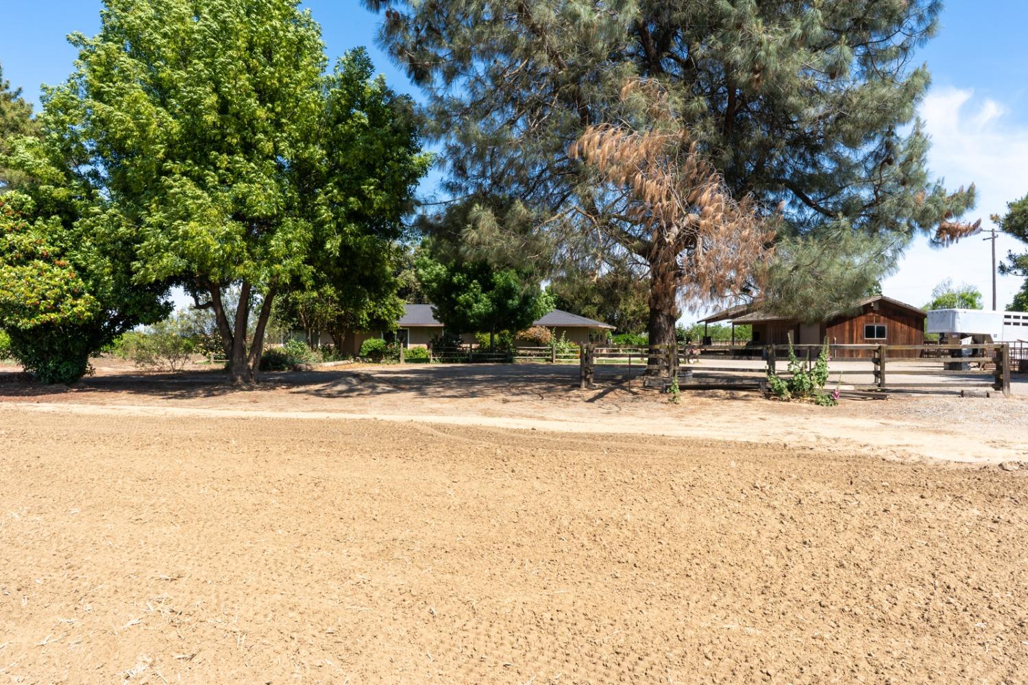 3789 Highway 33 Gustine, CA 95322 - Photo 1 of 1 a view of swimming pool with trees