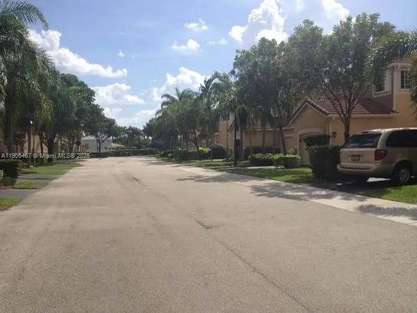 a view of a street with a building