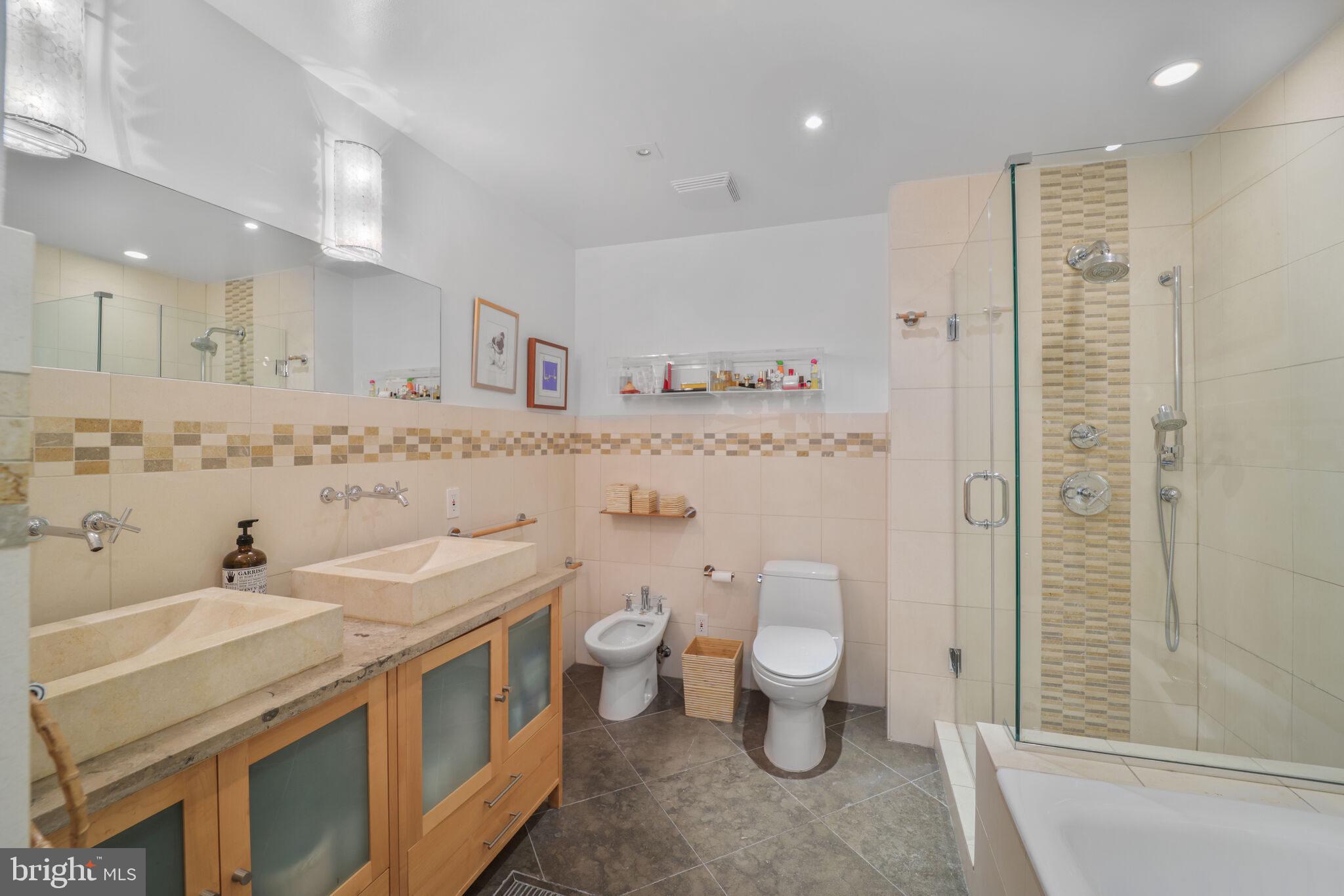 3927 Georgetown Court Northwest Washington, DC 20007 - Photo 21 of 34 a view of bathroom with a sink and a toilet