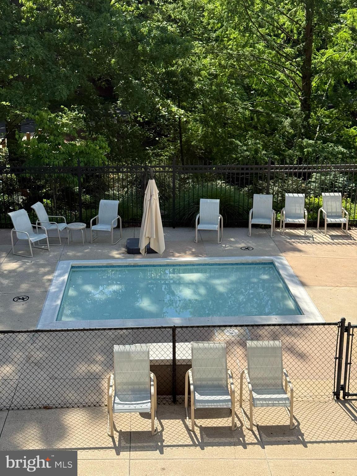 3927 Georgetown Court Northwest Washington, DC 20007 - Photo 33 of 34 a view of a swimming pool with a chair