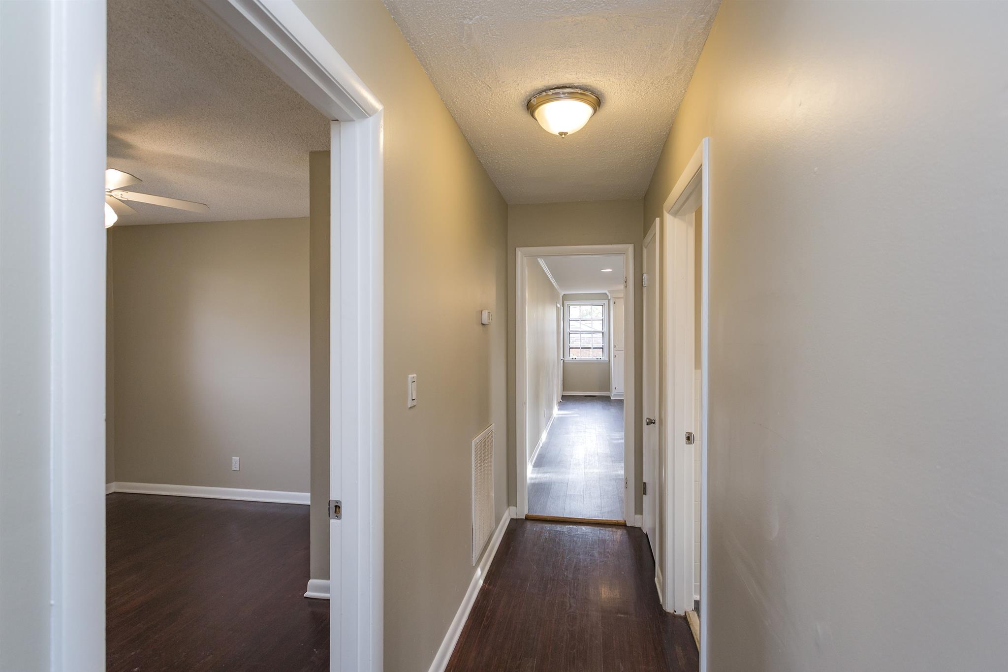505 Harding Place Nashville, TN 37211 - Photo 15 of 24 a view of a hallway with wooden floor