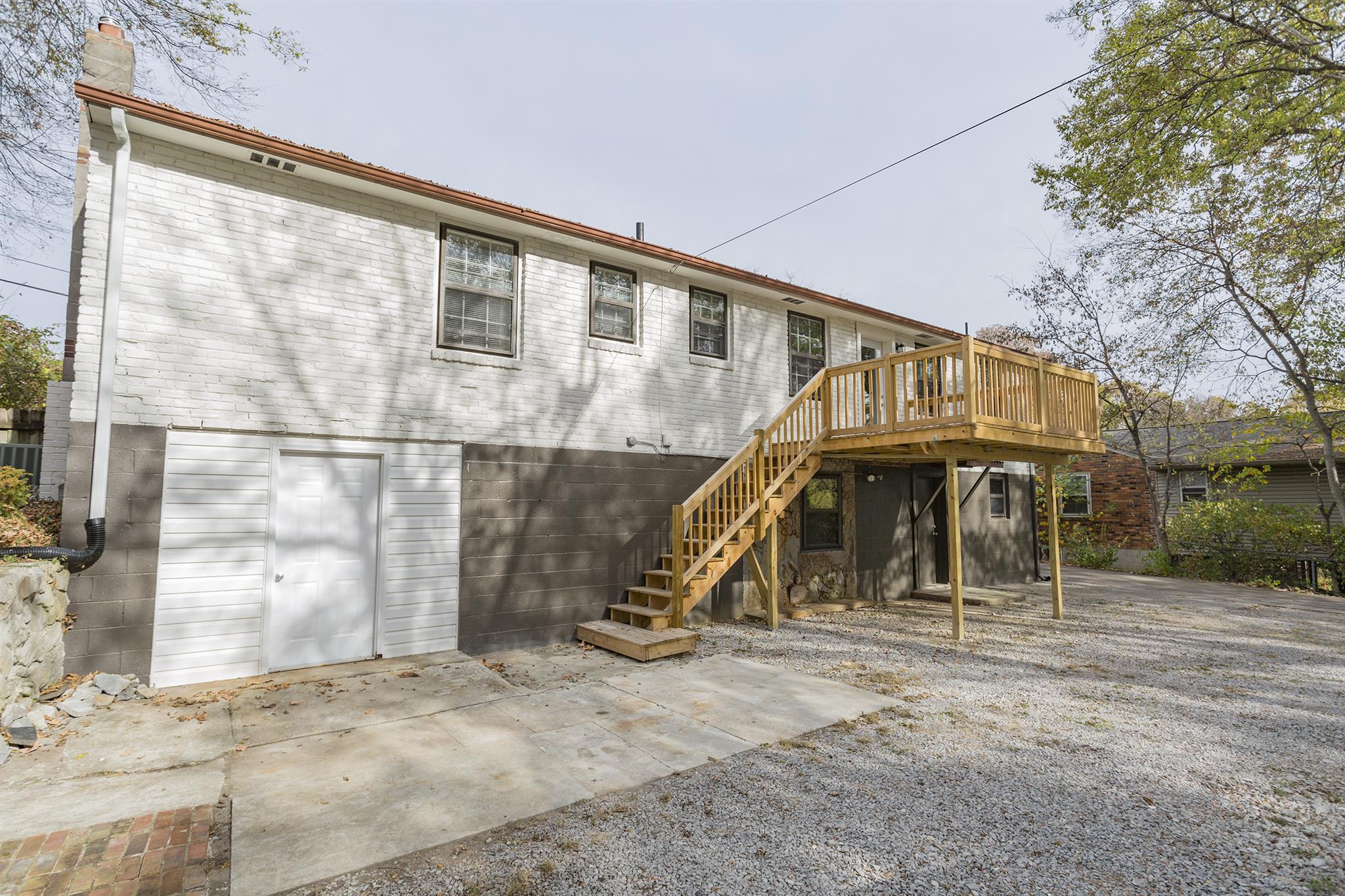 505 Harding Place Nashville, TN 37211 - Photo 24 of 24 a view of wooden house with large trees