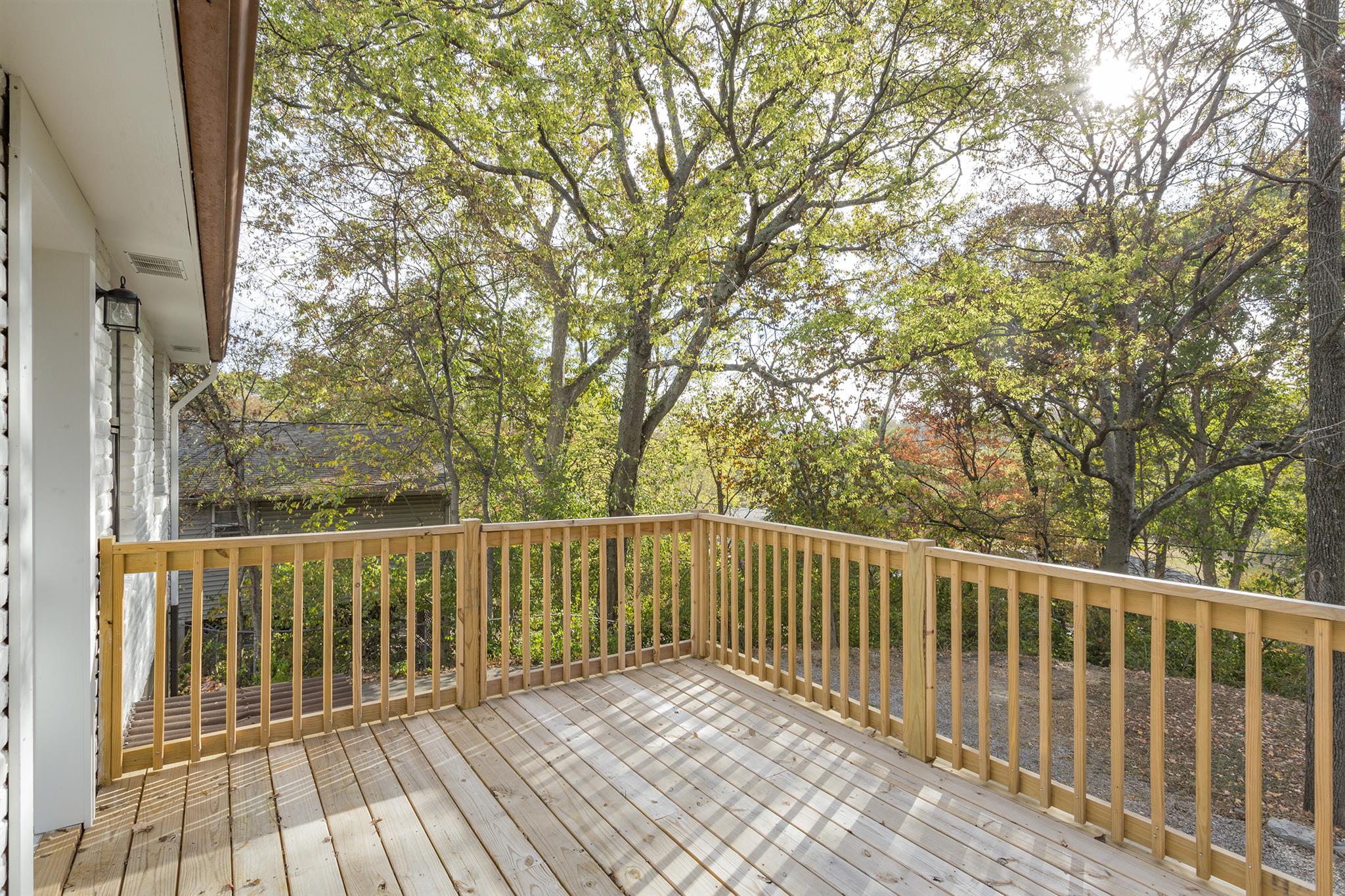 505 Harding Place Nashville, TN 37211 - Photo 10 of 24 a view of a wooden roof deck