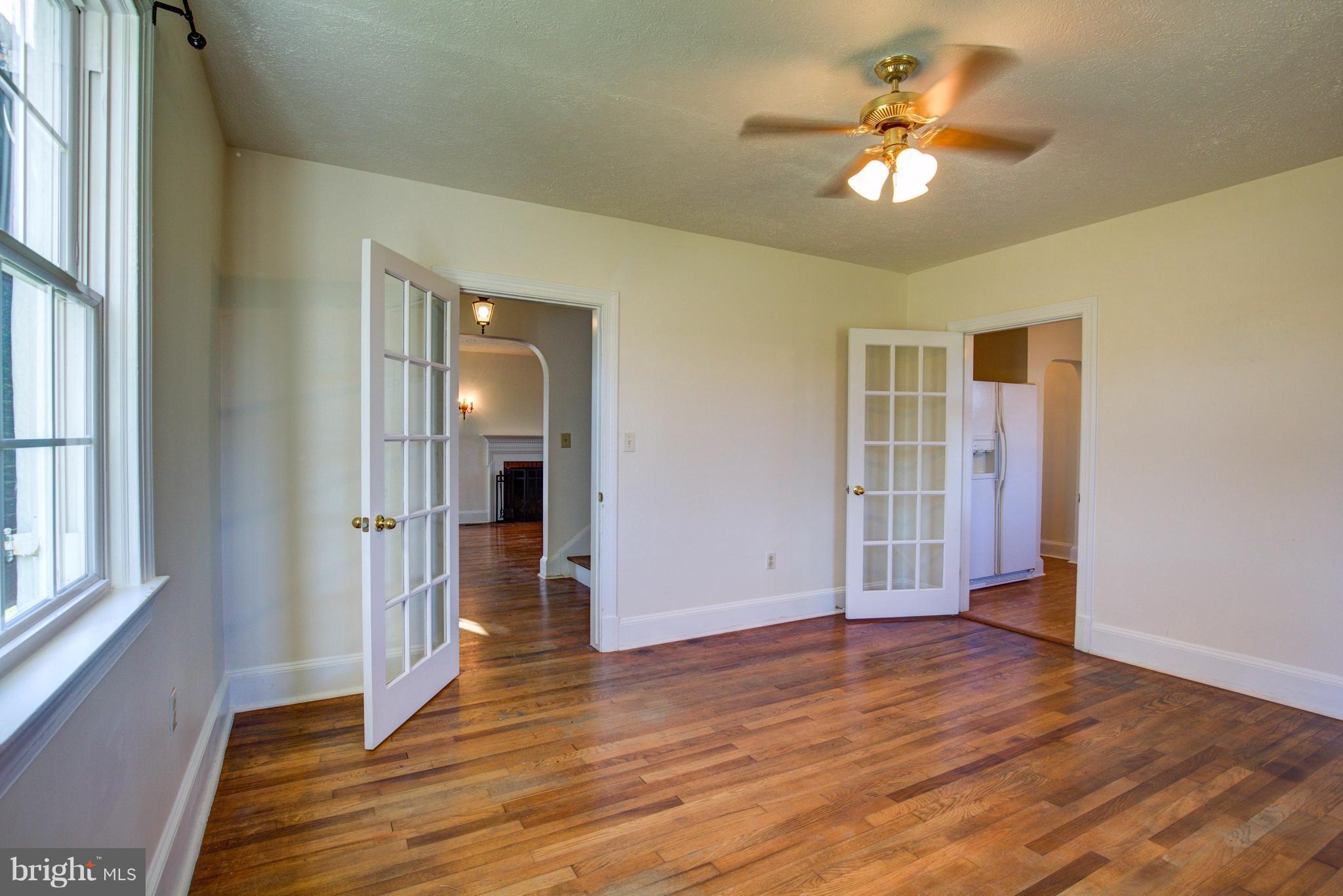 155 Summerville Road Boyce, VA 22620 - Photo 13 of 20 wooden floor in an empty room with a window