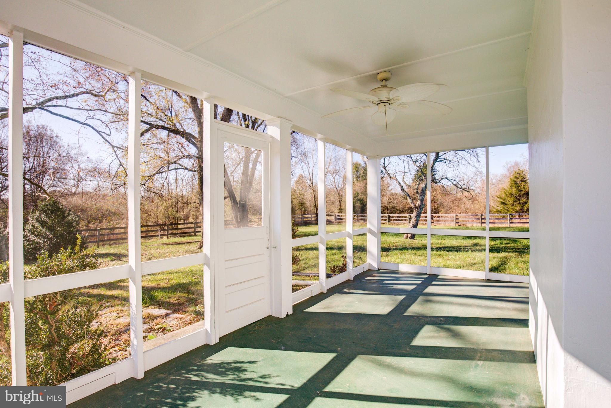 155 Summerville Road Boyce, VA 22620 - Photo 9 of 20 a view of swimming pool with a floor to ceiling window and wooden floor