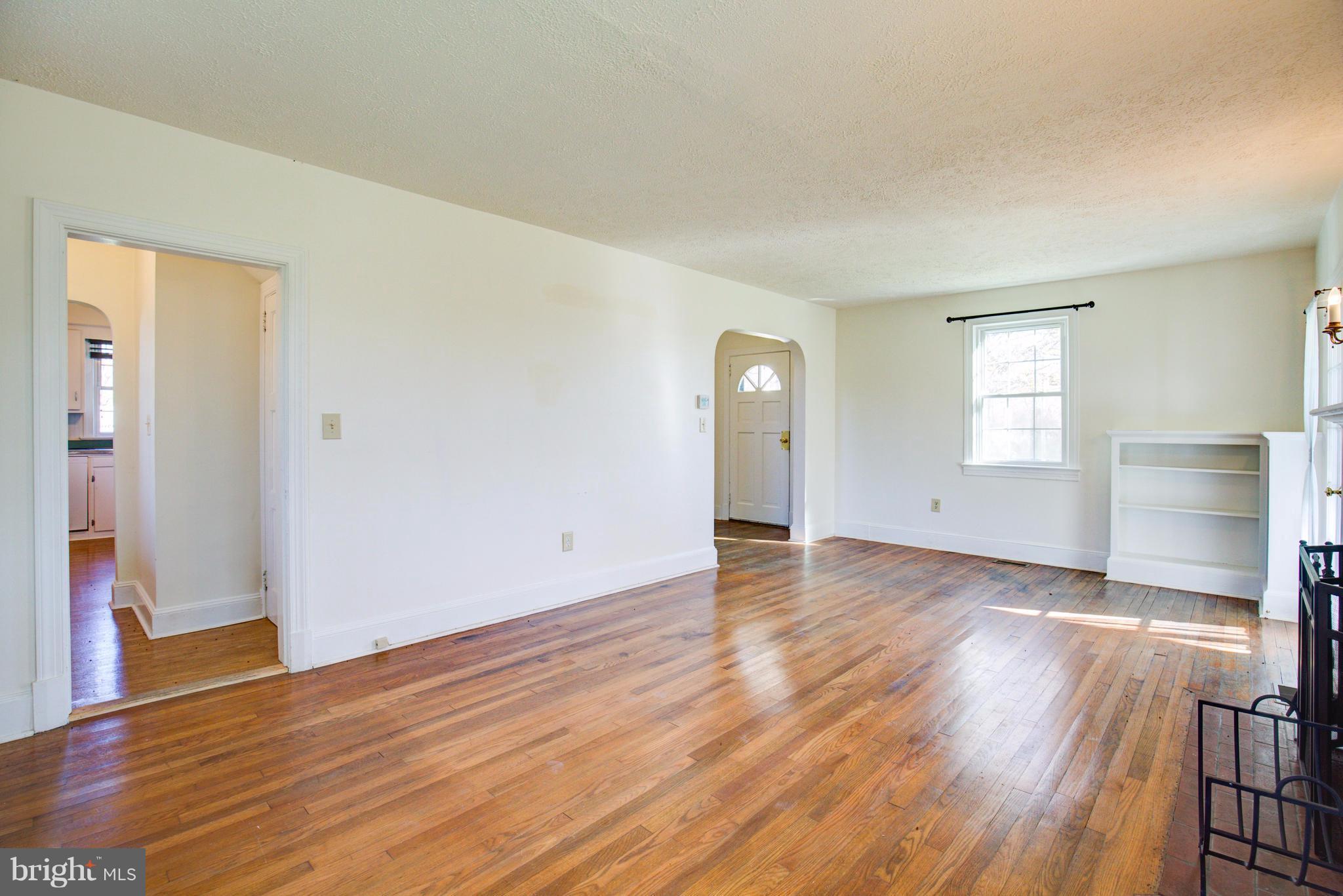 155 Summerville Road Boyce, VA 22620 - Photo 10 of 20 an empty room with wooden floor and window