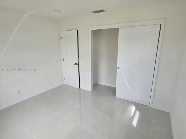 a bathroom with a sink and toilet