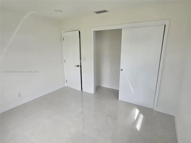 a bathroom with a sink and toilet