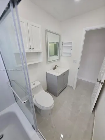 a view of a livingroom with a staircase