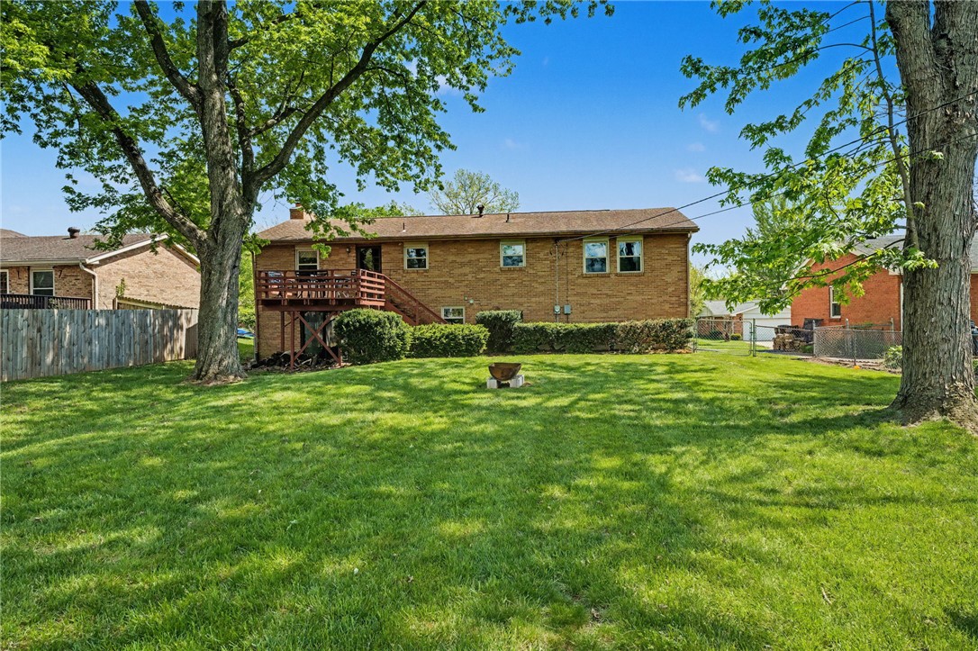 4919 Silver Arrow Drive Riverside, OH 45424 - Photo 51 of 57 This residence features a spacious backyard with a deck, perfect for outdoor living.