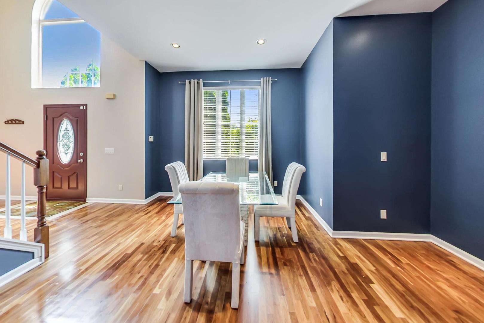 2101 Bull Ridge Drive McHenry, IL 60050 - Photo 12 of 83 a view of a dining room with furniture and wooden floor