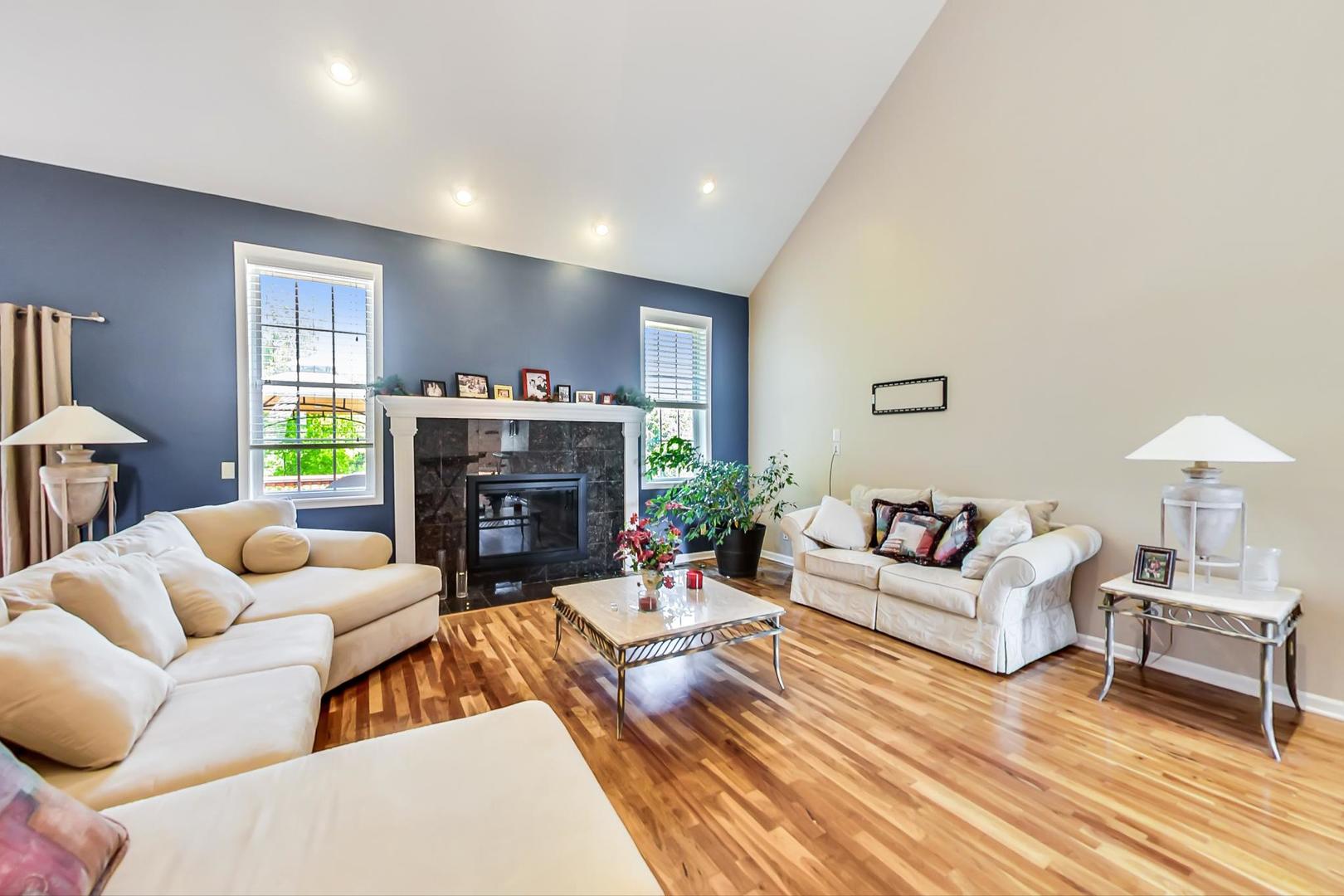 2101 Bull Ridge Drive McHenry, IL 60050 - Photo 21 of 83 a living room with furniture and a fireplace
