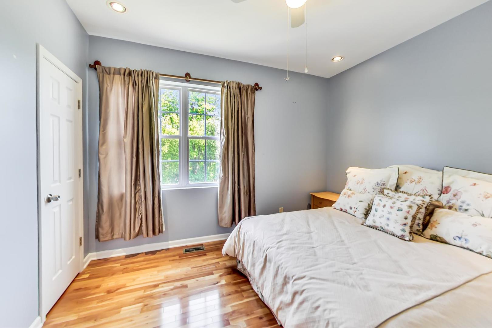 2101 Bull Ridge Drive McHenry, IL 60050 - Photo 35 of 83 a bedroom with a bed and a window