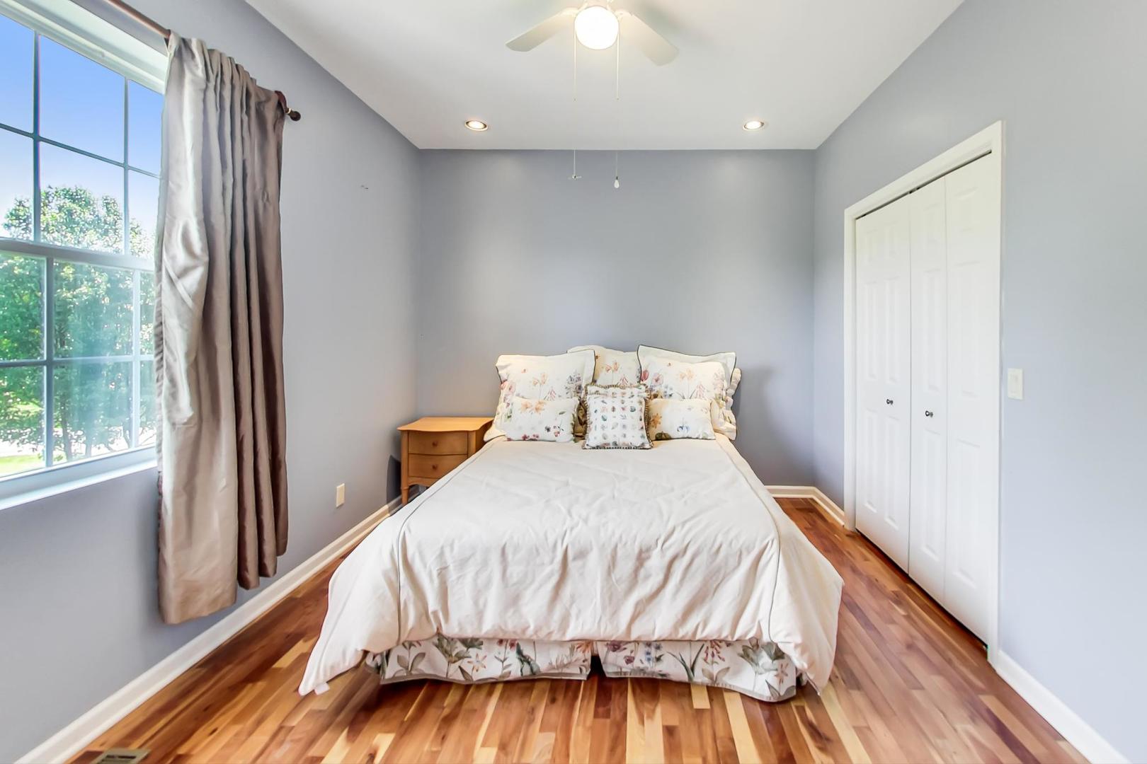 2101 Bull Ridge Drive McHenry, IL 60050 - Photo 36 of 83 a bedroom with a bed and a window