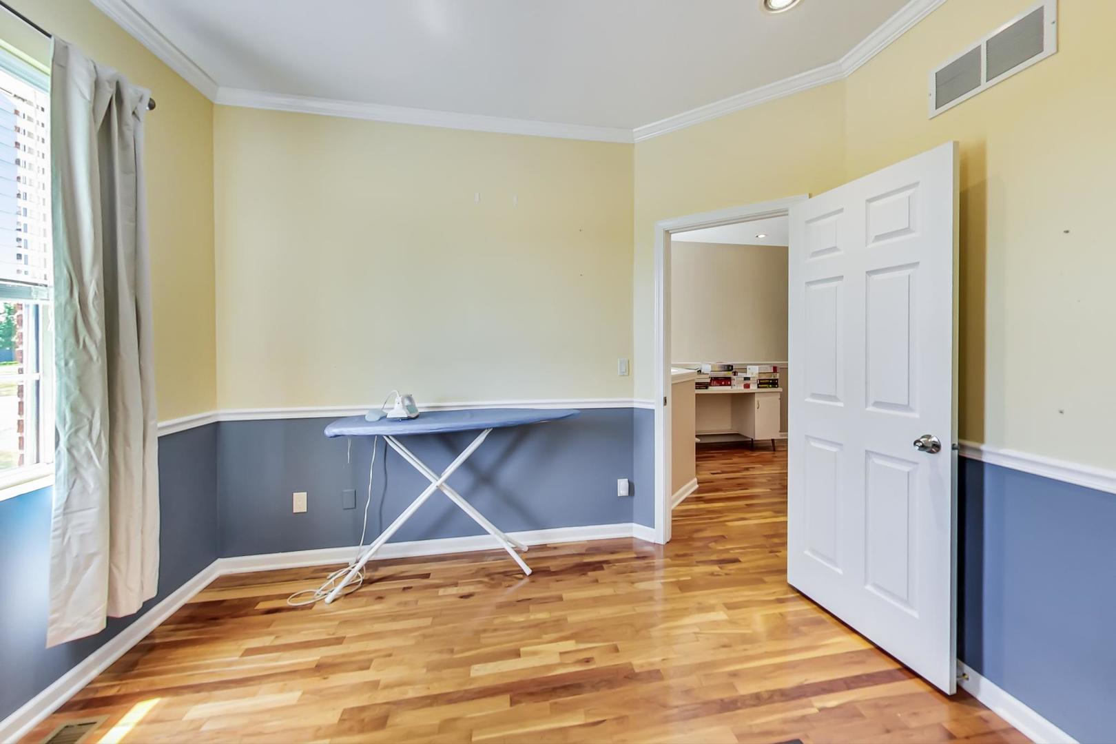2101 Bull Ridge Drive McHenry, IL 60050 - Photo 40 of 83 a view of an empty room with wooden floor and a window